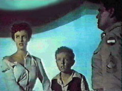 Helena Carter and Jimmy Hunt in a scene from the movie